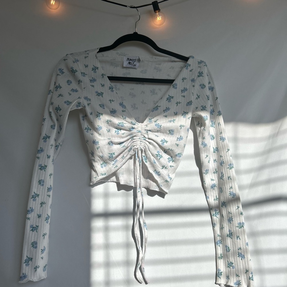 Princess Polly top. Long sleeve with floral print.